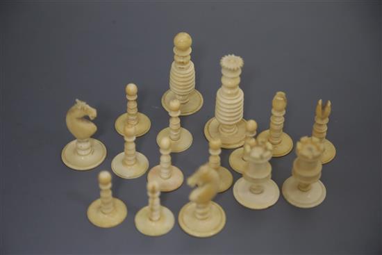 A late 18th century English white and red ivory chess set,